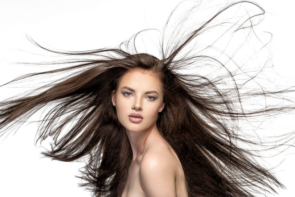 face-beautiful-woman-with-long-brown-hair-posing1-studio