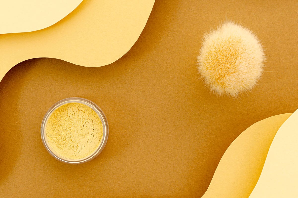 powder-fluffy-brush-beige-background1